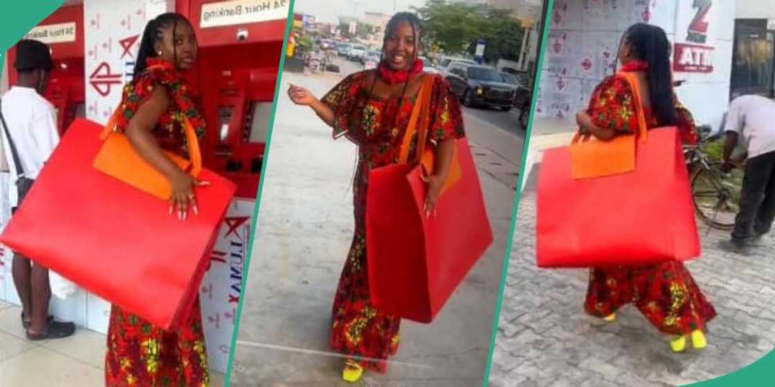 Nigerian girl storms the street with big bag Nigerian girl storms the street with big bag