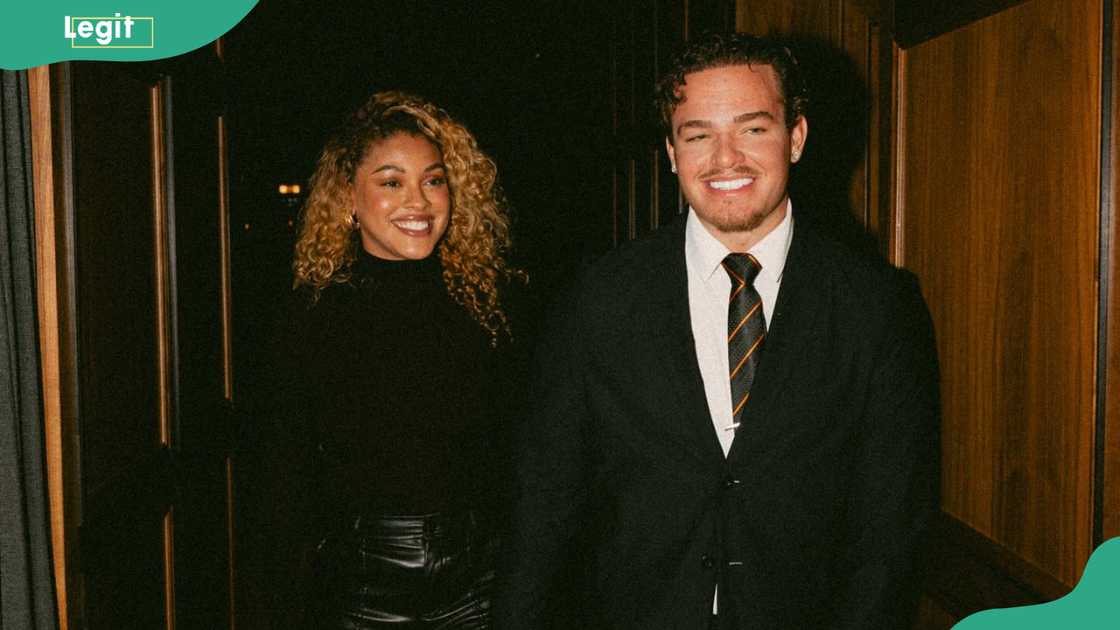 Hannah and Marco walk side by side. Hannah and Marco walk side by side.