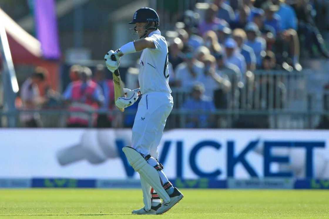 England's Joe Root walks back to the pavilion