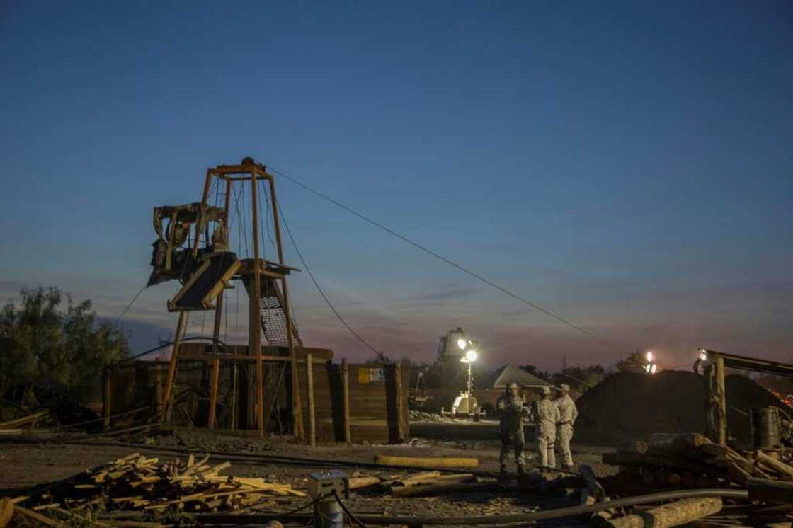 Rescuers work at a coal mine in northern Mexico where 10 people are trapped Rescuers work at a coal mine in northern Mexico where 10 people are trapped