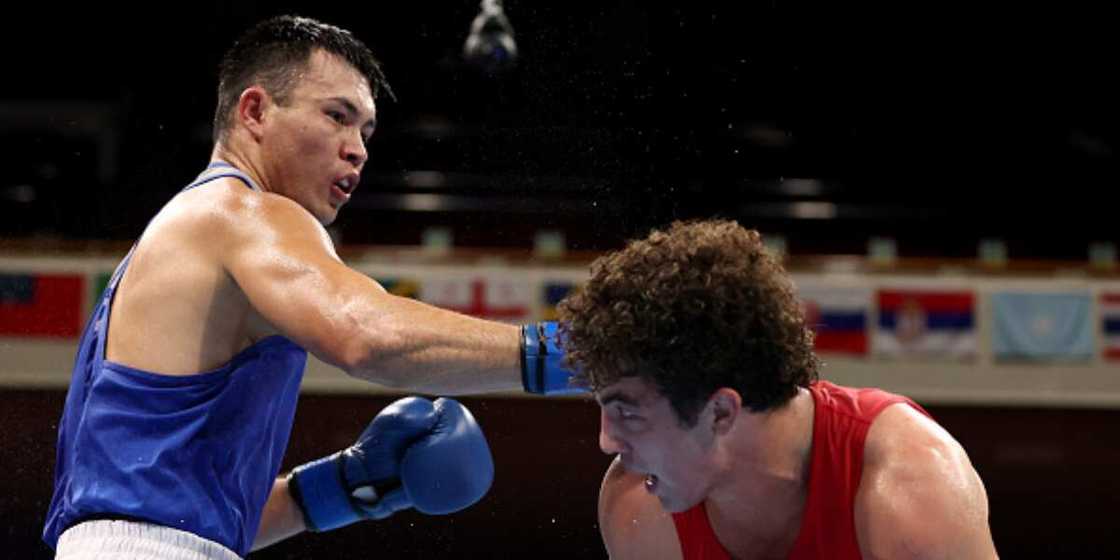 Kamshybek Kunkabayev (blue) Kamshybek Kunkabayev (blue)