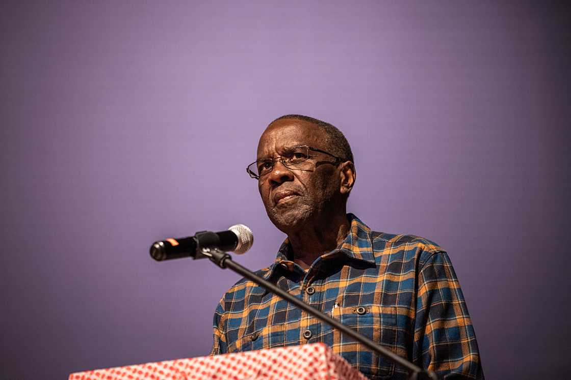 Man giving speech on a podium