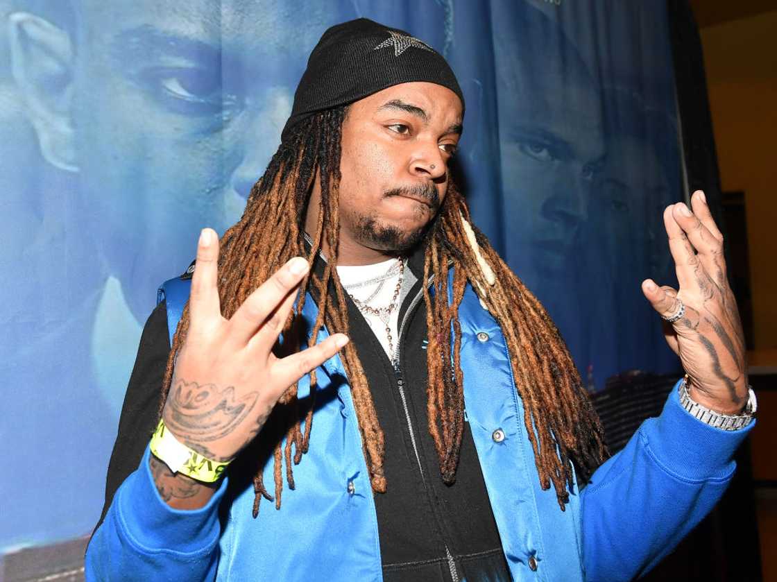 Record Producer Wheezy poses with his hands at AMC Phipps Plaza