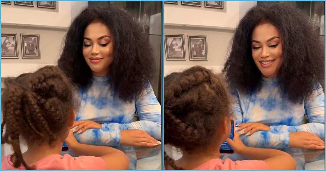 Nadia Buari's pretty daughter reads Bible, netizens drool Nadia Buari's pretty daughter reads Bible, netizens drool