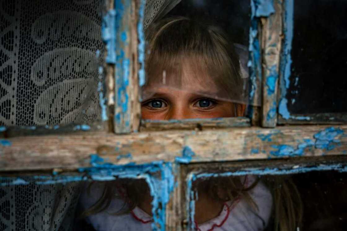 With lessons taking place at home to the sound of shelling, this is no ordinary first day back at school