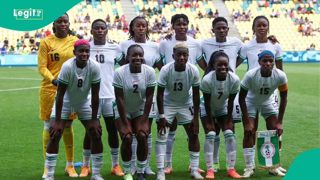 Nigeria Super Falcons players pose before the match against Japan at the Paris 2024 Olympic Games. Photo by ROMAIN PERROCHEAU