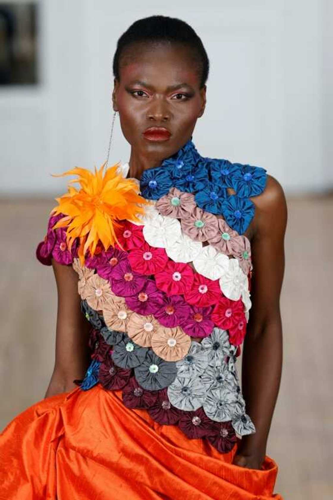 The flowers were made from the bark of the Obom tree The flowers were made from the bark of the Obom tree