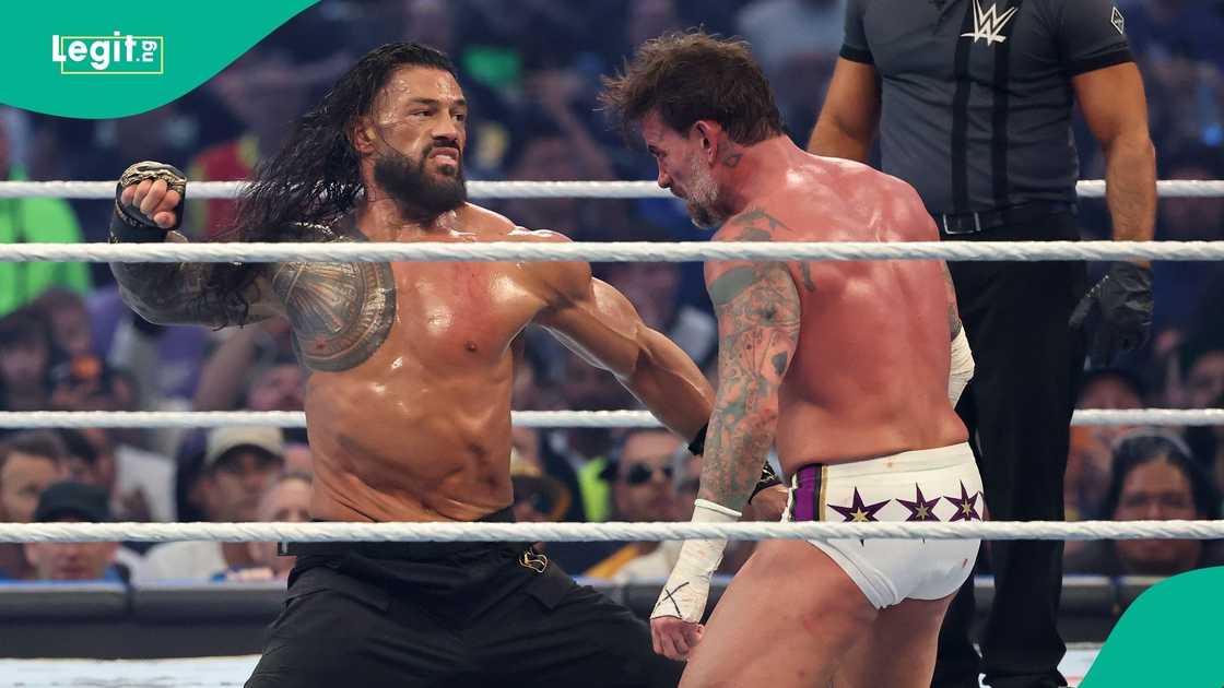 Roman Reigns, Oba Femi, CM Punk, WWE, Las Vegas, USA. Roman Reigns, Oba Femi, CM Punk, WWE, Las Vegas, USA.