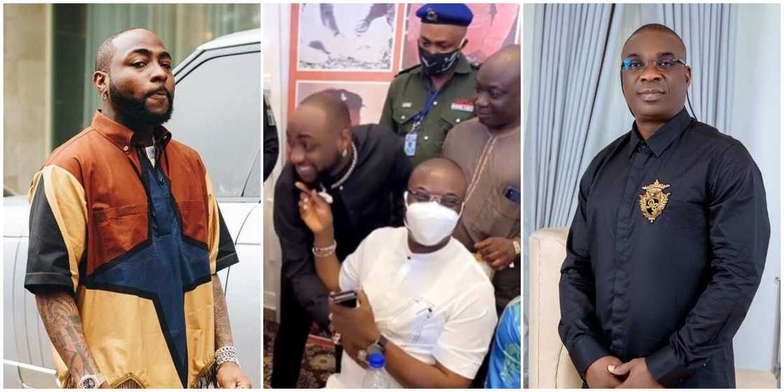 Reactions trail KWAM1 for pulling Davido's beards after singer greeted him at party Reactions trail KWAM1 for pulling Davido's beards after singer greeted him at party