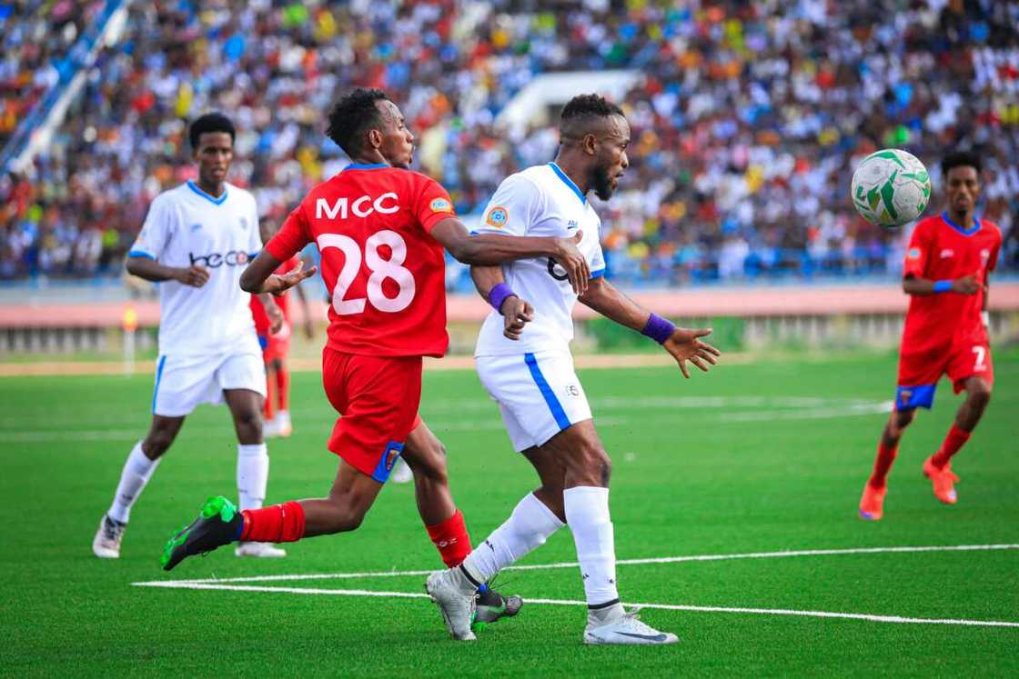 Men playing footbal