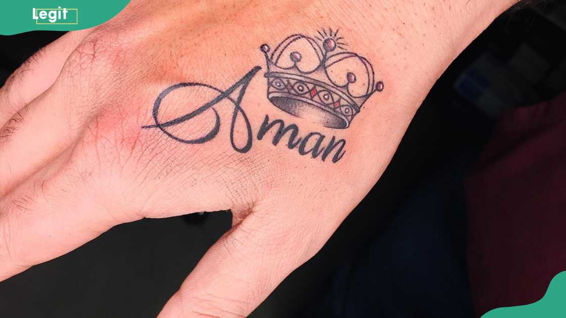 Name with a crown tattoo