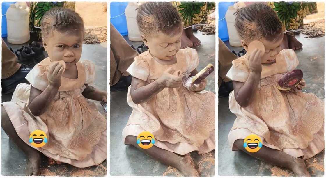 A little girl using brown powder on her face. A little girl using brown powder on her face.