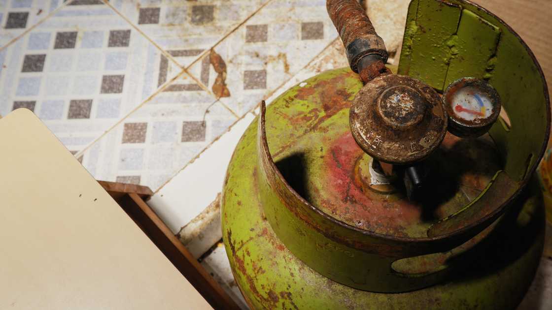 A green gas cylinder