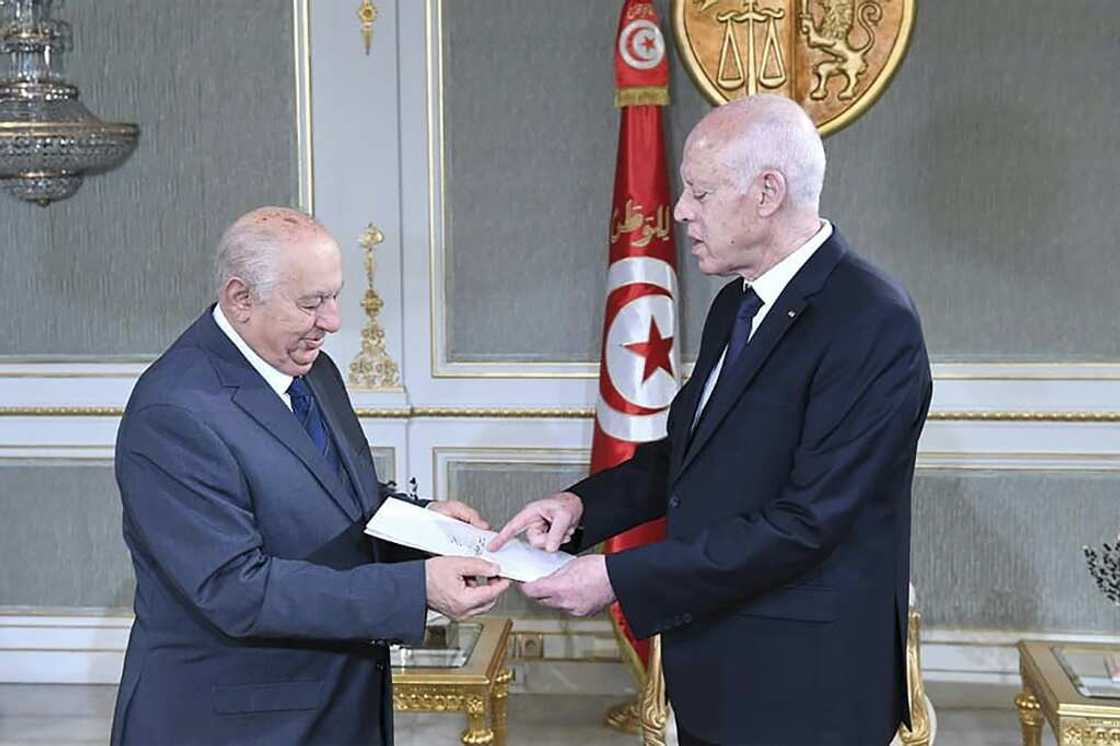 Tunisian President Kais Saied (R) has published an amended version of a draft constitution after an earlier iteration was criticised for the level of power it gave his office Tunisian President Kais Saied (R) has published an amended version of a draft constitution after an earlier iteration was criticised for the level of power it gave his office