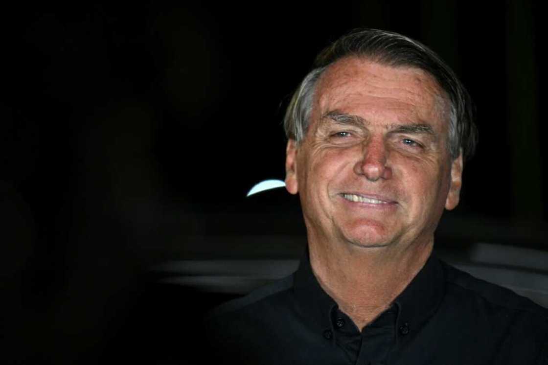 Brazilian President and re-election candidate Jair Bolsonaro makes an appearance after learning he has made it into a runoff election October 30 Brazilian President and re-election candidate Jair Bolsonaro makes an appearance after learning he has made it into a runoff election October 30