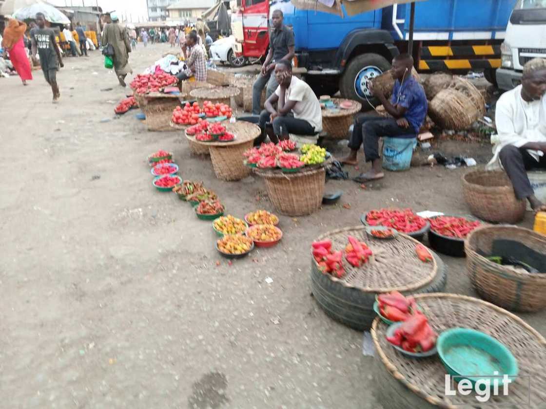 Pepper sellers waiting patiently for buyers at Mile 12 international market, Lagos. Photo credit: Esther Odili Pepper sellers waiting patiently for buyers at Mile 12 international market, Lagos. Photo credit: Esther Odili