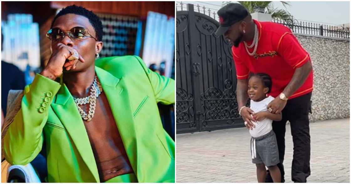 Wizkid on green jacket, Davido holds his late son Ifeanyi Wizkid on green jacket, Davido holds his late son Ifeanyi