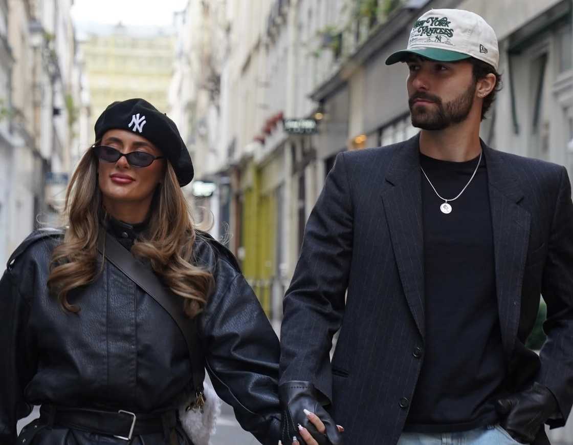 Zac Woodworth walks with Millie Court