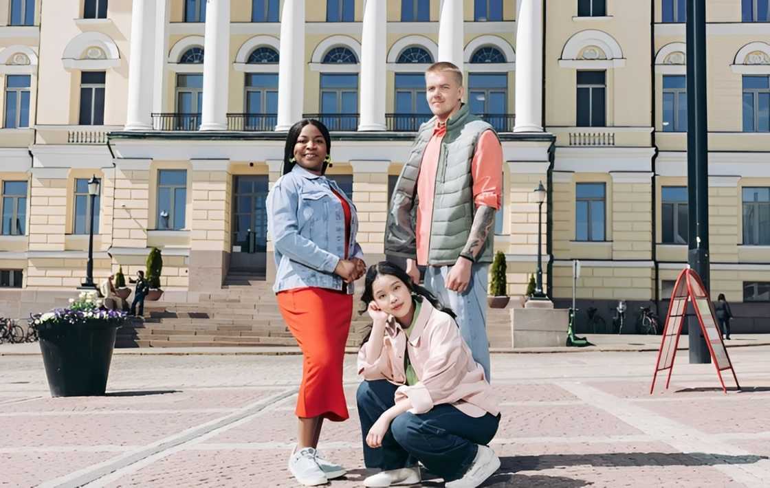 Students posing infront of a building