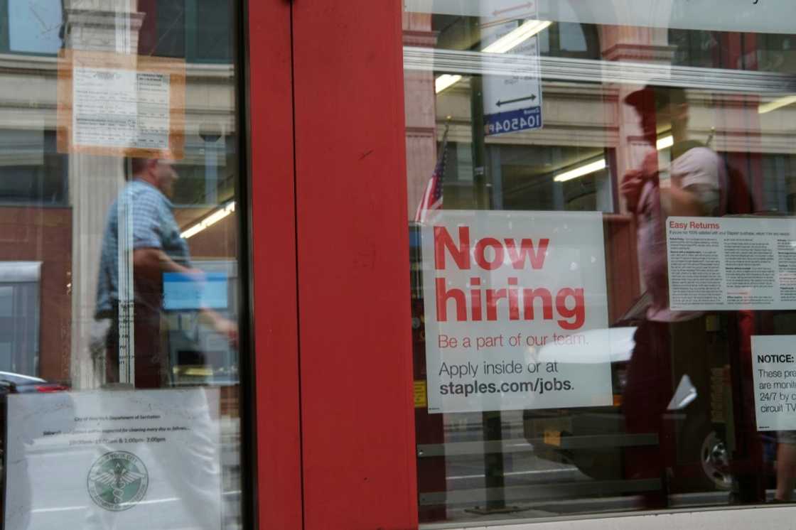 US hiring surged past expectations in December while unemployment dipped, according to government figures