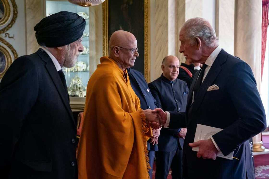 King Charles III (R) has described Britain as a 'community of communities' King Charles III (R) has described Britain as a 'community of communities'