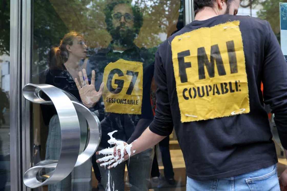 The Paris protest is part of a "Debt for climate" global campaign calling on G7 leaders to cancel the debts of poorer and less industrialised countries The Paris protest is part of a "Debt for climate" global campaign calling on G7 leaders to cancel the debts of poorer and less industrialised countries