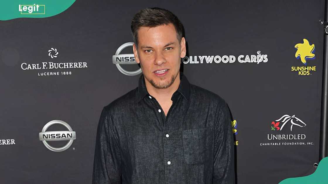 Theo Von in a black shirt at the red carpet for the 2nd Annual Hollywood Cares Invitational Theo Von in a black shirt at the red carpet for the 2nd Annual Hollywood Cares Invitational