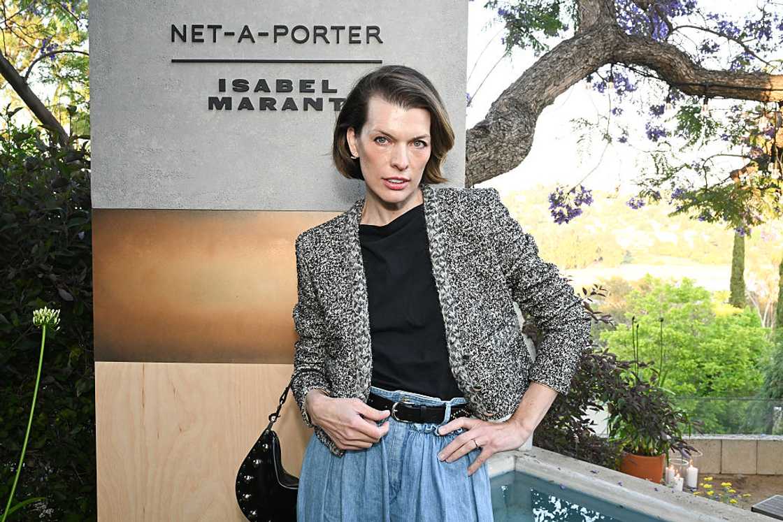 Milla Jovovich poses for a photo Milla Jovovich poses for a photo