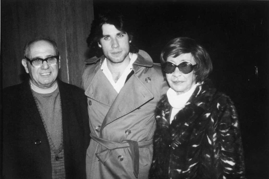 John Travolta with his father, Salvatore Travolta, and his mother, Helen Travolta. John Travolta with his father, Salvatore Travolta, and his mother, Helen Travolta.