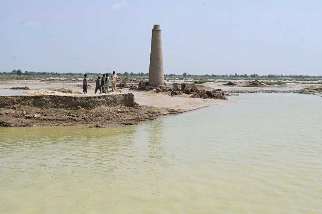 Though the floods that engulfed Aqilpur and its surrounding fields have receded from the highs of a week ago, the kilns are still surrounded by water Though the floods that engulfed Aqilpur and its surrounding fields have receded from the highs of a week ago, the kilns are still surrounded by water