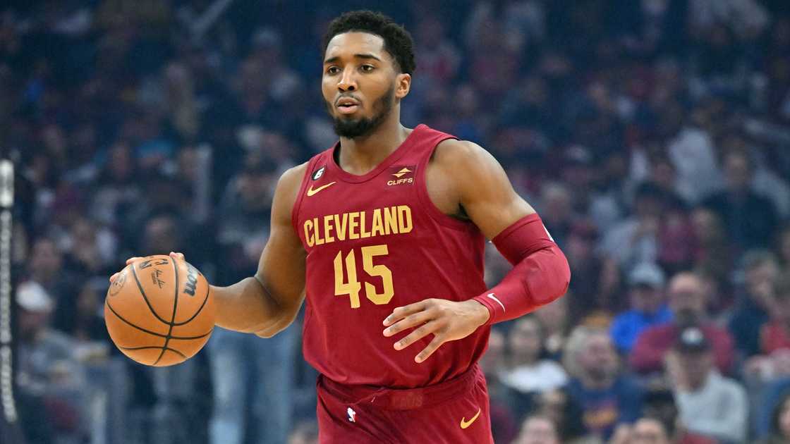 Donovan Mitchell of the Cleveland Cavaliers brings the ball up court against the Chicago Bulls Donovan Mitchell of the Cleveland Cavaliers brings the ball up court against the Chicago Bulls