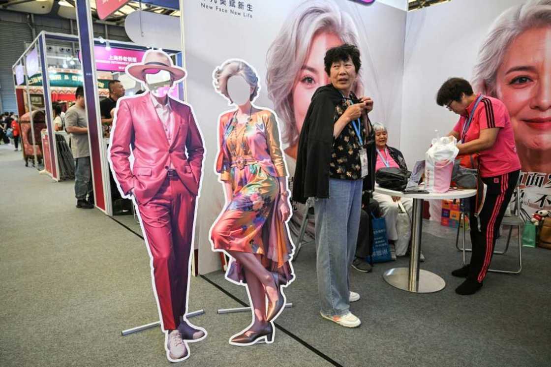 Rather than relying on people -- traditionally one's children -- to provide care, many of the trade fair's exhibitors showcased gadgets Rather than relying on people -- traditionally one's children -- to provide care, many of the trade fair's exhibitors showcased gadgets