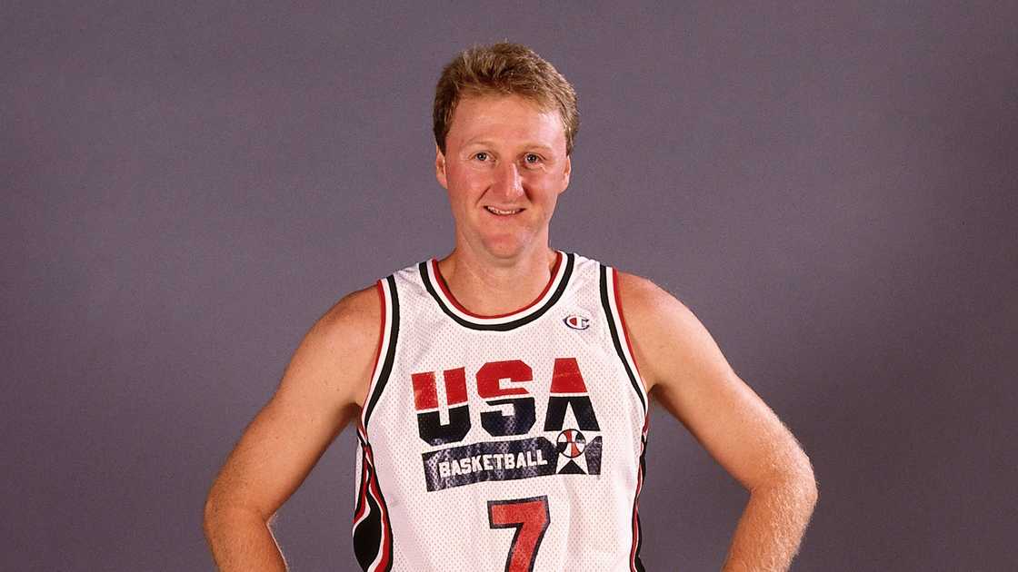 Larry Bird poses standing in the United States National Men's Basketball Team kit.