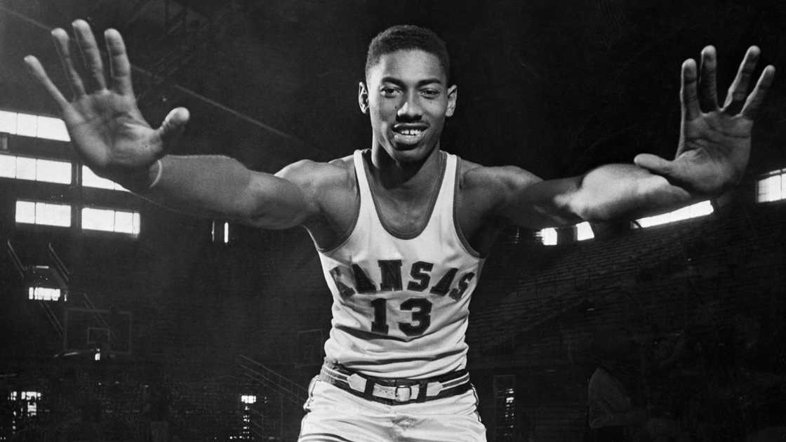 Wilt Chamberlain, poses for a photo while displaying his famous hands. Wilt Chamberlain, poses for a photo while displaying his famous hands.