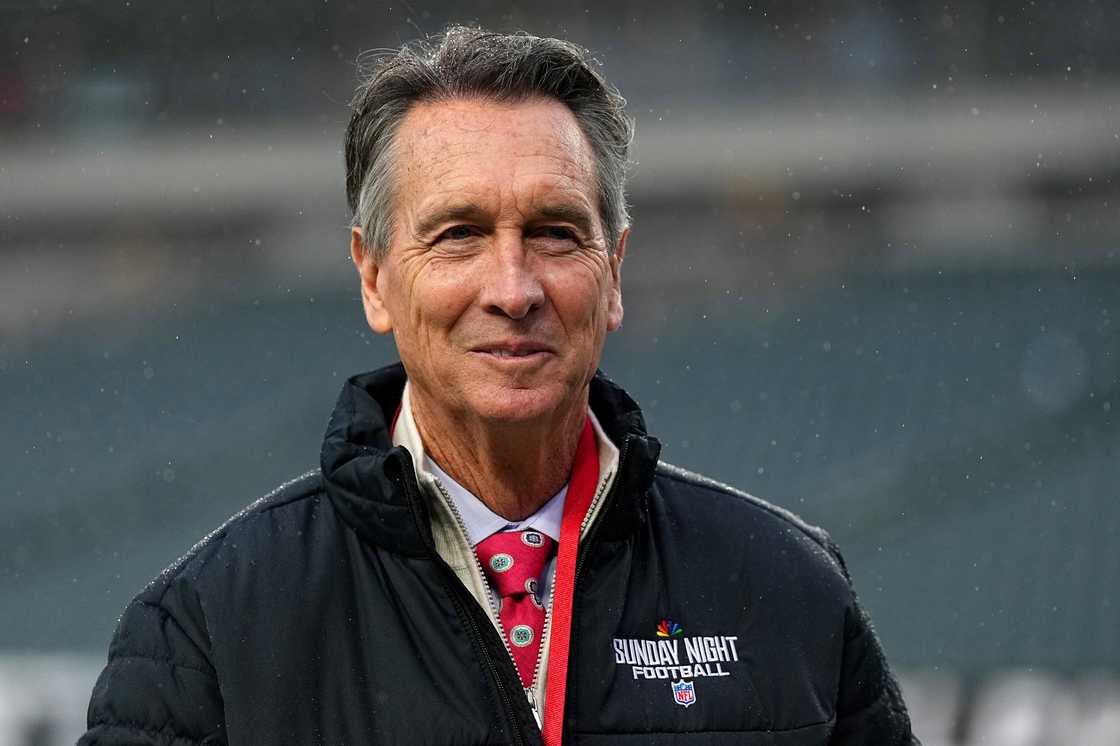 Cris Collinsworth looks on before the game between the Philadelphia Eagles and the Los Angeles Rams during the NFC Divisional Playoff at Lincoln Financial Field
