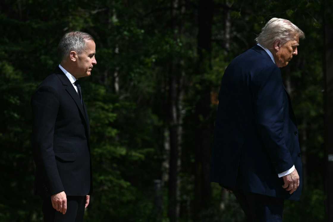 Canadian Prime Minister Mark Carney and US President Donald Trump at a G7 meeting in June
