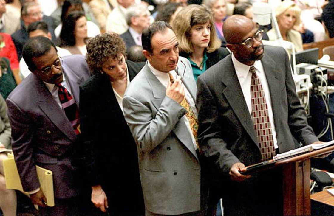 Attorneys in the OJ Simpson murder trial (L to R) Johnnie Cochran Jr., Marcia Clark, Robert Shapiro, Cheri Lewis, and Christopher Darden. Attorneys in the OJ Simpson murder trial (L to R) Johnnie Cochran Jr., Marcia Clark, Robert Shapiro, Cheri Lewis, and Christopher Darden.