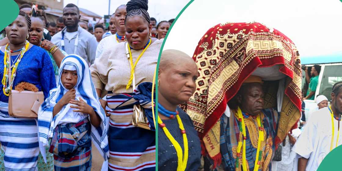 Chief priest helped Arugba to carry the heavy white calabash.
