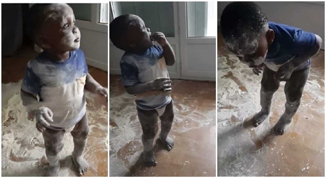 Little black boy spills his mother's powder and tries to walk away.