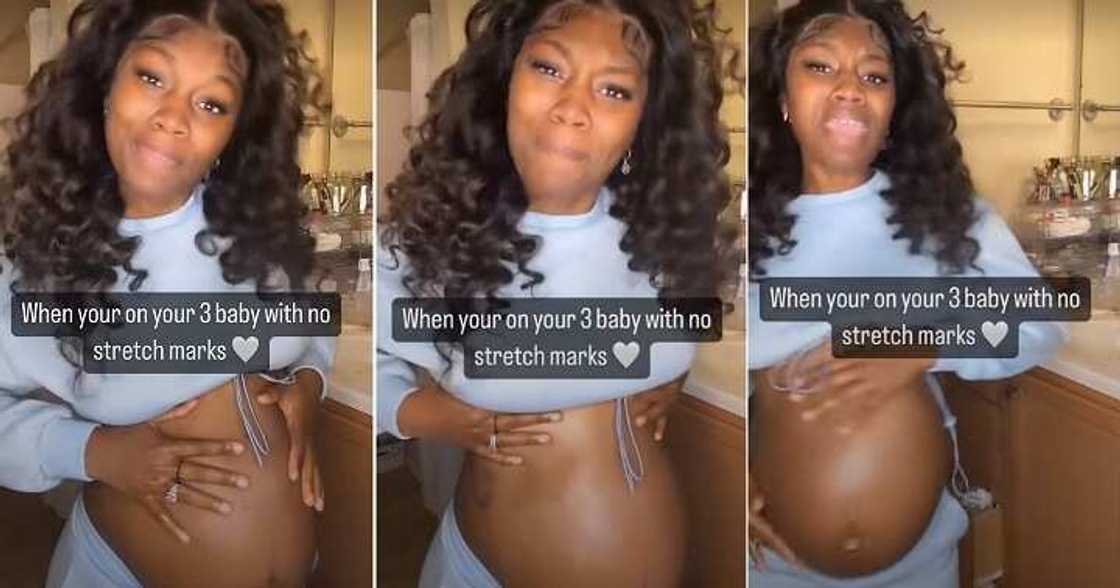 Pregnant woman displays baby bump Pregnant woman displays baby bump