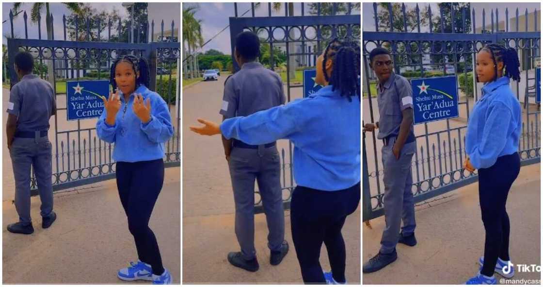 Security man, lady dances behind security man, Shehu Musa Yar'adua Centre, lady crushing on security man Security man, lady dances behind security man, Shehu Musa Yar'adua Centre, lady crushing on security man