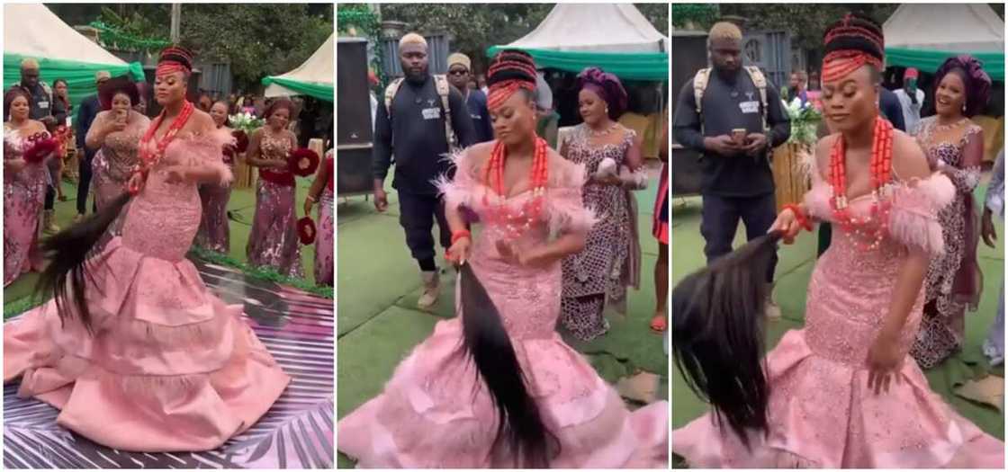 A beautiful Nigerian bride in a peach gown seen dancing at her reception A beautiful Nigerian bride in a peach gown seen dancing at her reception