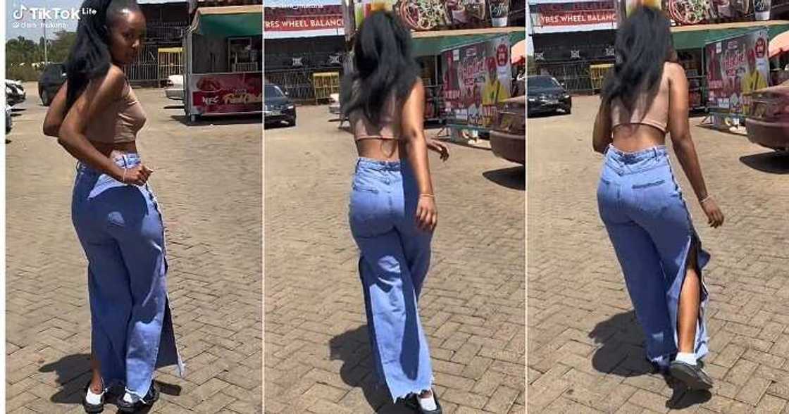 Lady in crop top whines her waist