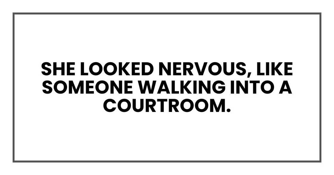 She looked nervous, like someone walking into a courtroom. She looked nervous, like someone walking into a courtroom.