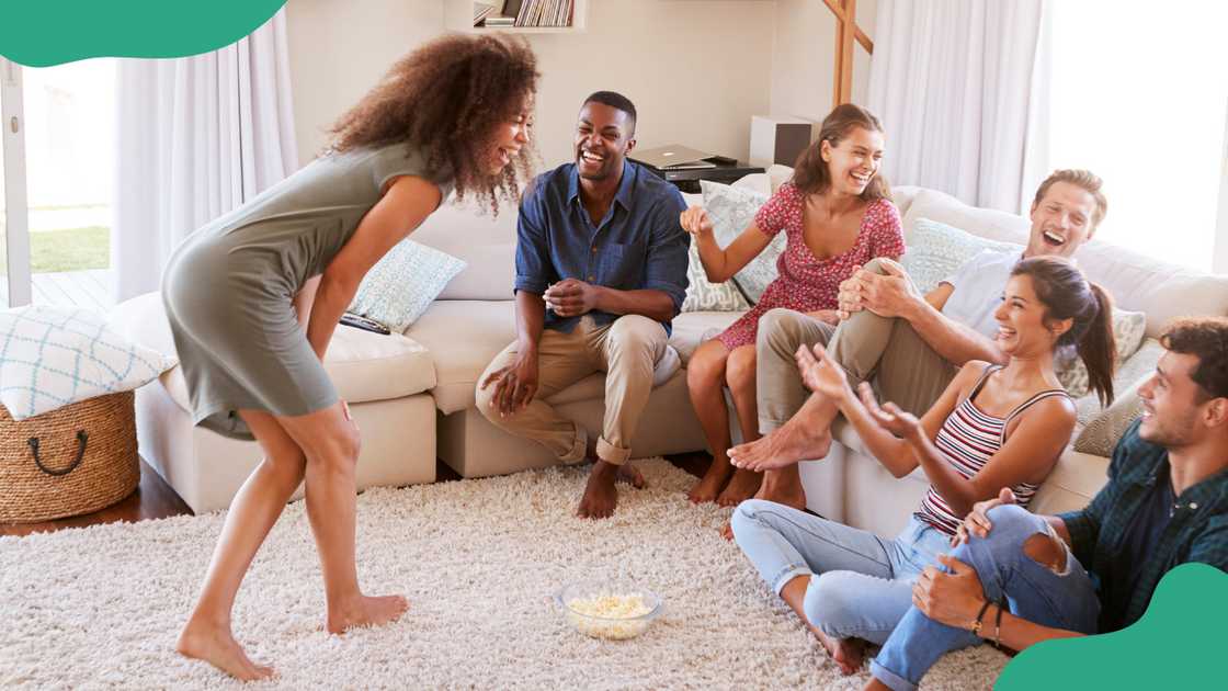 A group of friends pictured laughing together