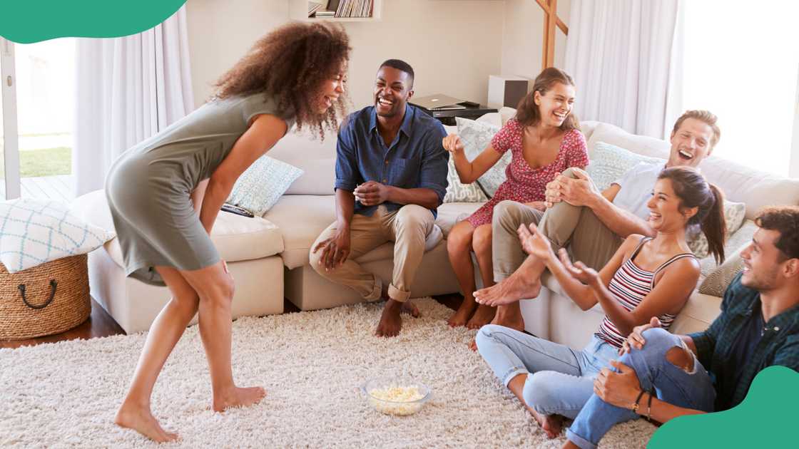 A group of friends pictured laughing together A group of friends pictured laughing together