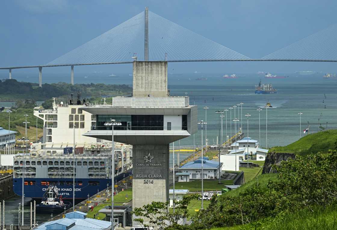 The Panama Canal, which handles 5 percent of global maritime trade, links the Caribbean Sea with the Pacific Ocean The Panama Canal, which handles 5 percent of global maritime trade, links the Caribbean Sea with the Pacific Ocean