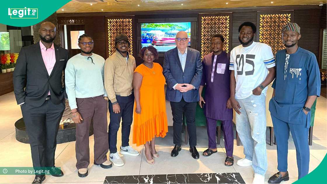 L-R: Victor Enengedi; Felix Imoh; Godwin Chukwu; Doreen Mbaya; Earl J. Wilkinson; Nurudeen Lawal; Rahaman Abiola; and Ismaila Yinusa.