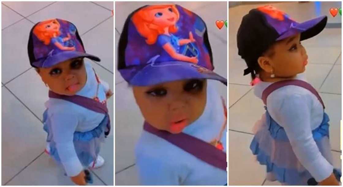 Little girl in fez cap Little girl in fez cap