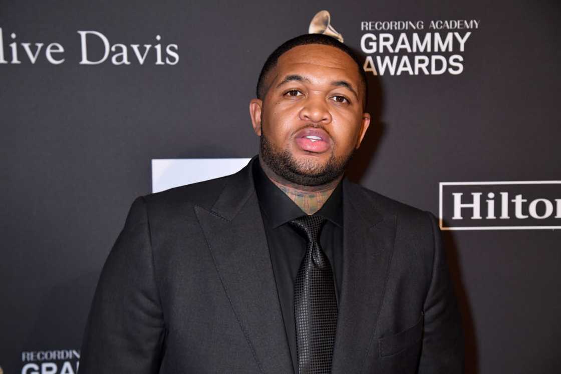 DJ Mustard pose at The Beverly Hilton Hotel